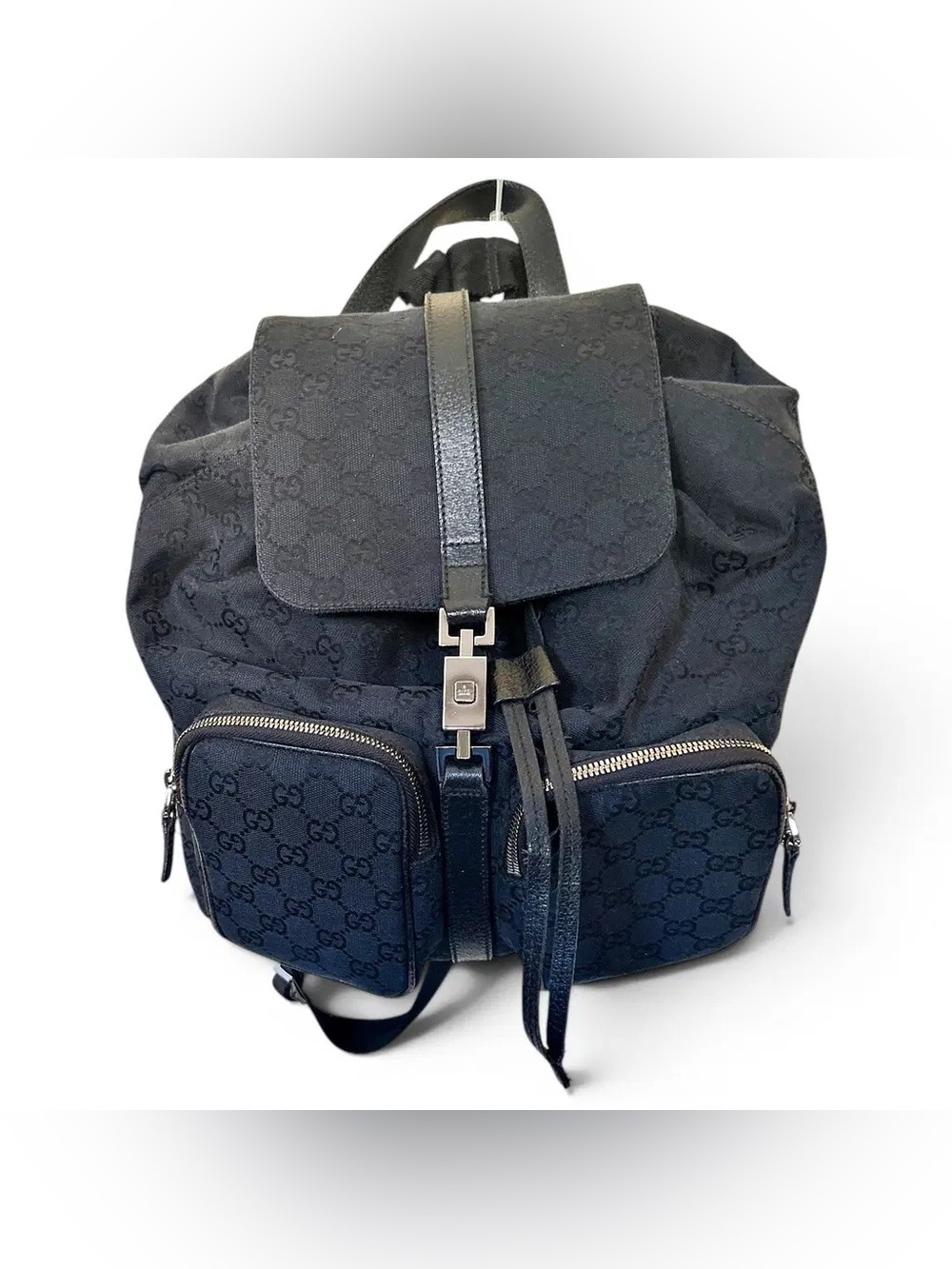 Vintage Gucci GG Canvas Jackie Lock Backpack crafted in black monogram canvas